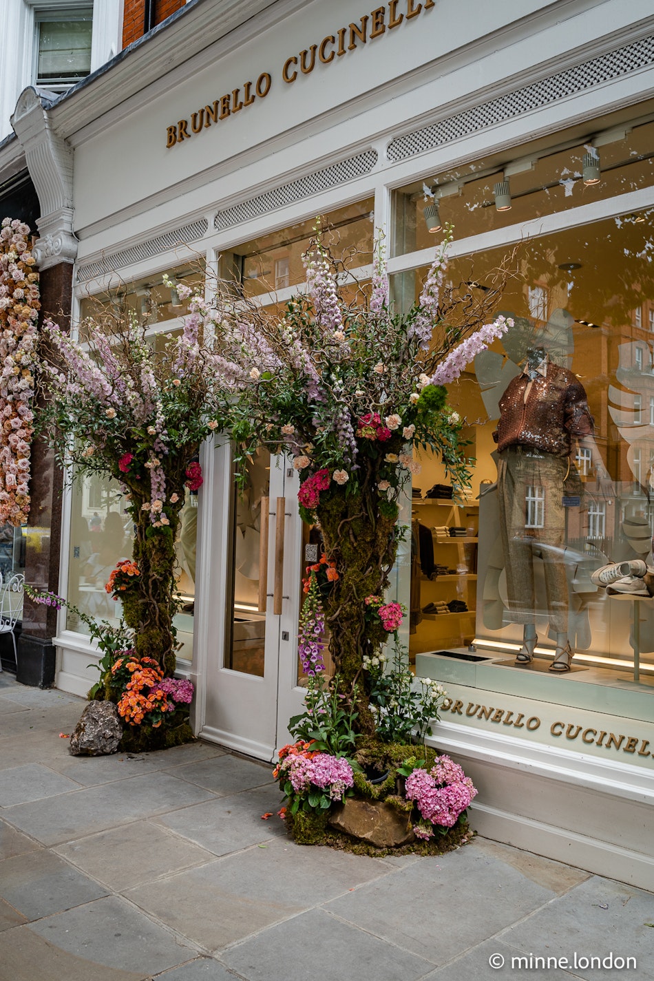Floral installation in front of Brunello Cucinelli store