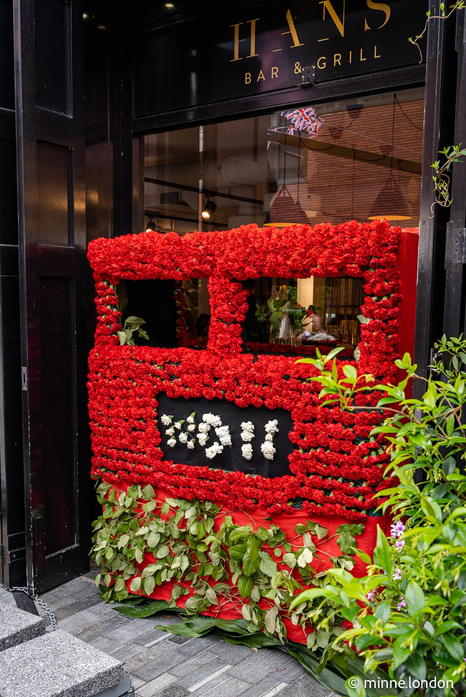 Hans' Bar and Grill London Bus floral display