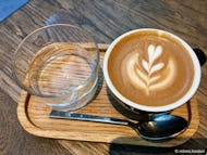 A perfectly made flat white in a City of London coffee shop