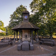 The Time Flies clocktower next to the Broad Walk Cafe
