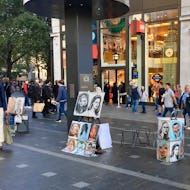 Portraits  made by street artists on Leicester Square