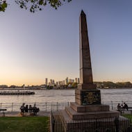 Bellot Memorial Greenwich with Canary Wharf in the background