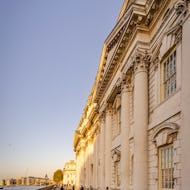 Old Royal Naval College buildings next to the Thames
