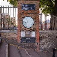 The 24-hour gate clock and measures for a foot and a yard