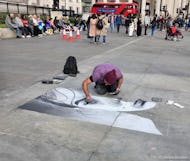 Street artist drawing on Trafalgar Square