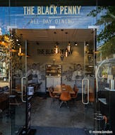 The Black Penny coffee house and dining on Duke of York Square
